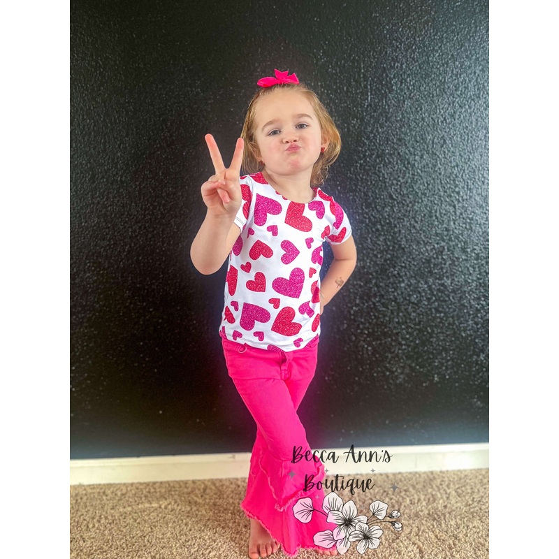 Brielle Top Shirt|NB|0/3m|3/6m|6/9m|9/12m|12/18m|18/24m|2T|3T|4T|5T|5/6Y|7/8Y|9/10Y|11/12Y|12/14Y|Standard|Cropped|Straps (Tie at shoulders/Neck Tie/Tank Straps/Cross Back) — Specify in notes|Short Sleeve|Long Sleeve